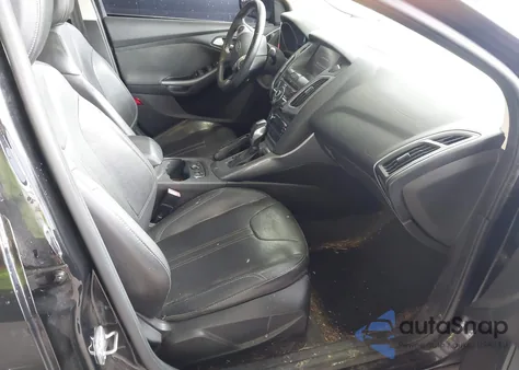 2013 Ford Focus Titanium z USA, uszkodzony, nr VIN 1FADP3J22DL150622